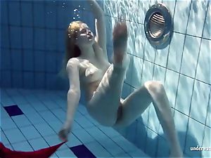 molten platinum-blonde Lucie French nubile in the pool
